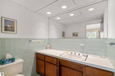 Mid-century modern classic, designed by renowned Charlevoix on Charlevoix Golf Club in Michigan - for sale on GolfHomes.com, golf home, golf lot