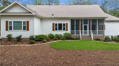 Welcome to this stunning, modern home located in the highly on Pinewild Country Club of Pinehurst in North Carolina - for sale on GolfHomes.com, golf home, golf lot