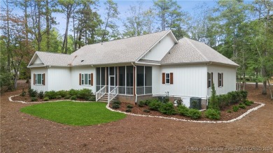 Welcome to this stunning, modern home located in the highly on Pinewild Country Club of Pinehurst in North Carolina - for sale on GolfHomes.com, golf home, golf lot