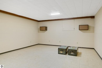 Mid-century modern classic, designed by renowned Charlevoix on Charlevoix Golf Club in Michigan - for sale on GolfHomes.com, golf home, golf lot