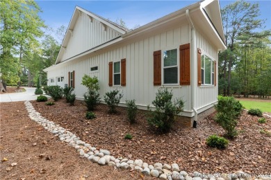 Welcome to this stunning, modern home located in the highly on Pinewild Country Club of Pinehurst in North Carolina - for sale on GolfHomes.com, golf home, golf lot