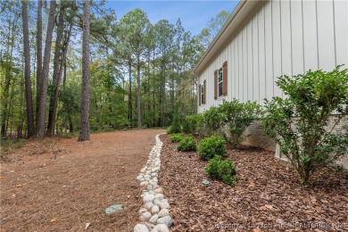 Welcome to this stunning, modern home located in the highly on Pinewild Country Club of Pinehurst in North Carolina - for sale on GolfHomes.com, golf home, golf lot