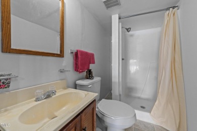 This cozy 2-bedroom, 2-bath home offers the perfect blend of on River Golf and County Club at Lake Royale in North Carolina - for sale on GolfHomes.com, golf home, golf lot