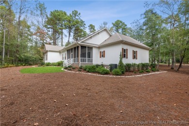 Welcome to this stunning, modern home located in the highly on Pinewild Country Club of Pinehurst in North Carolina - for sale on GolfHomes.com, golf home, golf lot