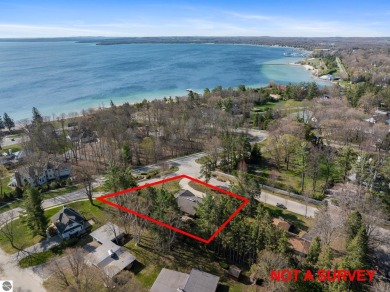 Mid-century modern classic, designed by renowned Charlevoix on Charlevoix Golf Club in Michigan - for sale on GolfHomes.com, golf home, golf lot