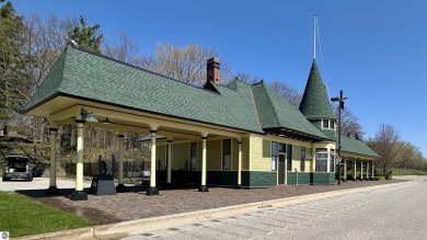 Mid-century modern classic, designed by renowned Charlevoix on Charlevoix Golf Club in Michigan - for sale on GolfHomes.com, golf home, golf lot