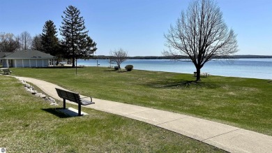 Mid-century modern classic, designed by renowned Charlevoix on Charlevoix Golf Club in Michigan - for sale on GolfHomes.com, golf home, golf lot