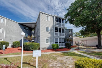 Downtown Calabash! This first-floor furnished condo has been on Carolina Shores Golf Course in North Carolina - for sale on GolfHomes.com, golf home, golf lot