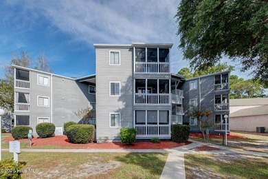 Downtown Calabash! This first-floor furnished condo has been on Carolina Shores Golf Course in North Carolina - for sale on GolfHomes.com, golf home, golf lot