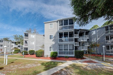 Downtown Calabash! This first-floor furnished condo has been on Carolina Shores Golf Course in North Carolina - for sale on GolfHomes.com, golf home, golf lot