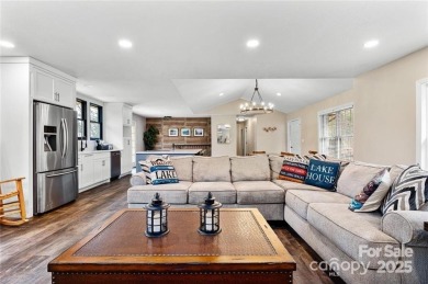 This beautifully updated turn-key furnished home is located on Rumbling Bald Resort on Lake Lure in North Carolina - for sale on GolfHomes.com, golf home, golf lot