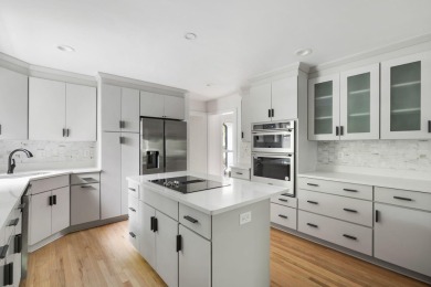 This beautifully updated charmer boasts dual primary suites -- on Snee Farm Country Club in South Carolina - for sale on GolfHomes.com, golf home, golf lot
