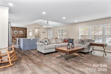 This beautifully updated turn-key furnished home is located on Rumbling Bald Resort on Lake Lure in North Carolina - for sale on GolfHomes.com, golf home, golf lot