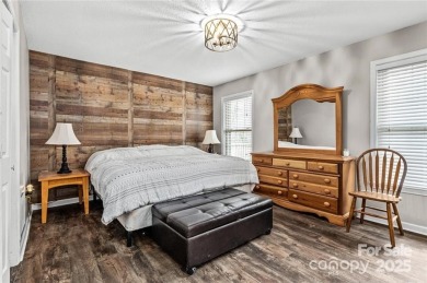 This beautifully updated turn-key furnished home is located on Rumbling Bald Resort on Lake Lure in North Carolina - for sale on GolfHomes.com, golf home, golf lot