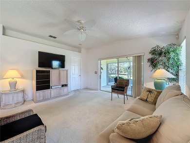 Fantastic views overlooking the golf course in guard gated 55+ on Kings Ridge Golf Club in Florida - for sale on GolfHomes.com, golf home, golf lot