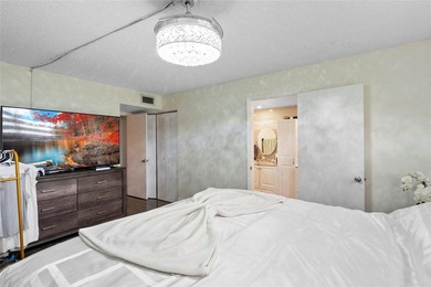 Welcome to this stunning 2-bed 2-bath condo located on the first on Boca Dunes Golf and Country Club in Florida - for sale on GolfHomes.com, golf home, golf lot