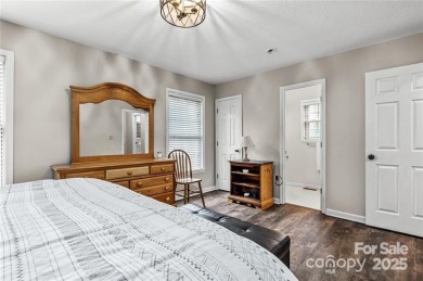 This beautifully updated turn-key furnished home is located on Rumbling Bald Resort on Lake Lure in North Carolina - for sale on GolfHomes.com, golf home, golf lot