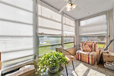 This beautifully renovated 2-bedroom, 2-bathroom condo in the on Sunrise Lakes Phase III in Florida - for sale on GolfHomes.com, golf home, golf lot