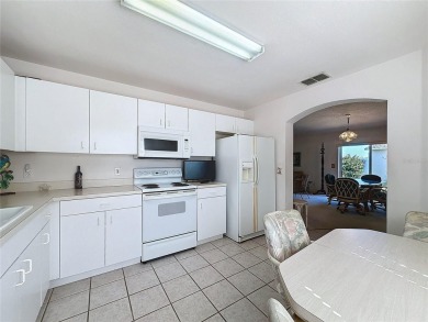 Fantastic views overlooking the golf course in guard gated 55+ on Kings Ridge Golf Club in Florida - for sale on GolfHomes.com, golf home, golf lot