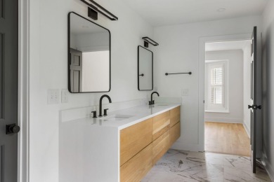 This beautifully updated charmer boasts dual primary suites -- on Snee Farm Country Club in South Carolina - for sale on GolfHomes.com, golf home, golf lot