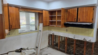 This home is located in the very popular Dana Shores on Rocky Point Golf Course in Florida - for sale on GolfHomes.com, golf home, golf lot