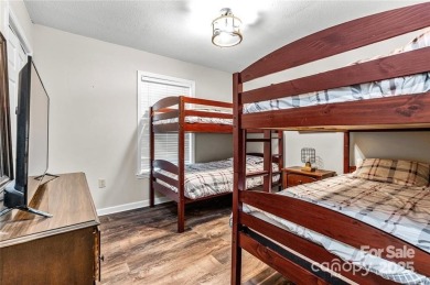 This beautifully updated turn-key furnished home is located on Rumbling Bald Resort on Lake Lure in North Carolina - for sale on GolfHomes.com, golf home, golf lot