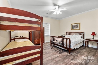 This beautifully updated turn-key furnished home is located on Rumbling Bald Resort on Lake Lure in North Carolina - for sale on GolfHomes.com, golf home, golf lot