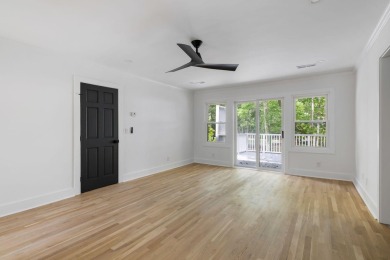 This beautifully updated charmer boasts dual primary suites -- on Snee Farm Country Club in South Carolina - for sale on GolfHomes.com, golf home, golf lot