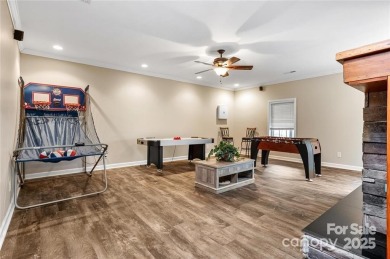 This beautifully updated turn-key furnished home is located on Rumbling Bald Resort on Lake Lure in North Carolina - for sale on GolfHomes.com, golf home, golf lot