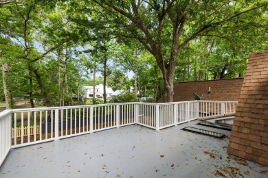 This beautifully updated charmer boasts dual primary suites -- on Snee Farm Country Club in South Carolina - for sale on GolfHomes.com, golf home, golf lot
