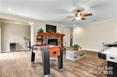 This beautifully updated turn-key furnished home is located on Rumbling Bald Resort on Lake Lure in North Carolina - for sale on GolfHomes.com, golf home, golf lot