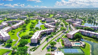 This beautifully renovated 2-bedroom, 2-bathroom condo in the on Sunrise Lakes Phase III in Florida - for sale on GolfHomes.com, golf home, golf lot