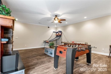 This beautifully updated turn-key furnished home is located on Rumbling Bald Resort on Lake Lure in North Carolina - for sale on GolfHomes.com, golf home, golf lot
