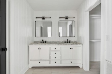 This beautifully updated charmer boasts dual primary suites -- on Snee Farm Country Club in South Carolina - for sale on GolfHomes.com, golf home, golf lot
