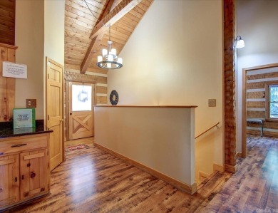 Discover your peaceful forest retreat in this inviting 3-bedroom on Cortez Golf Course in Arkansas - for sale on GolfHomes.com, golf home, golf lot