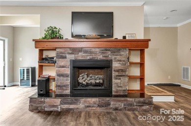 This beautifully updated turn-key furnished home is located on Rumbling Bald Resort on Lake Lure in North Carolina - for sale on GolfHomes.com, golf home, golf lot