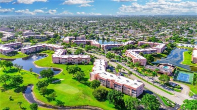This beautifully renovated 2-bedroom, 2-bathroom condo in the on Sunrise Lakes Phase III in Florida - for sale on GolfHomes.com, golf home, golf lot