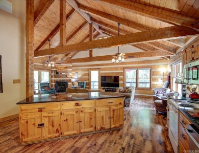 Discover your peaceful forest retreat in this inviting 3-bedroom on Cortez Golf Course in Arkansas - for sale on GolfHomes.com, golf home, golf lot