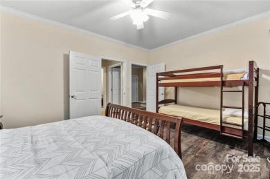 This beautifully updated turn-key furnished home is located on Rumbling Bald Resort on Lake Lure in North Carolina - for sale on GolfHomes.com, golf home, golf lot