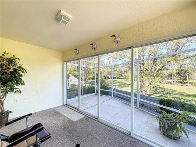 Fantastic views overlooking the golf course in guard gated 55+ on Kings Ridge Golf Club in Florida - for sale on GolfHomes.com, golf home, golf lot