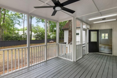 This beautifully updated charmer boasts dual primary suites -- on Snee Farm Country Club in South Carolina - for sale on GolfHomes.com, golf home, golf lot