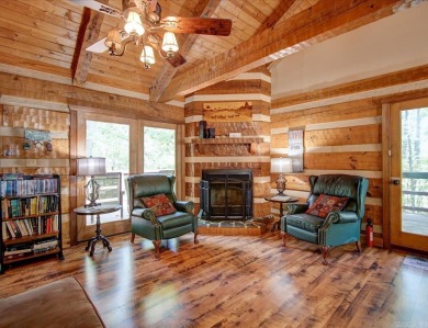 Discover your peaceful forest retreat in this inviting 3-bedroom on Cortez Golf Course in Arkansas - for sale on GolfHomes.com, golf home, golf lot