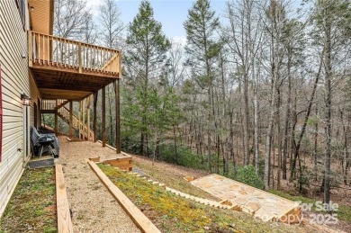 This beautifully updated turn-key furnished home is located on Rumbling Bald Resort on Lake Lure in North Carolina - for sale on GolfHomes.com, golf home, golf lot