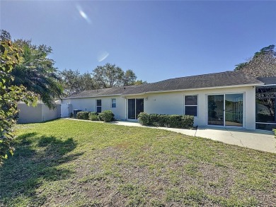 Fantastic views overlooking the golf course in guard gated 55+ on Kings Ridge Golf Club in Florida - for sale on GolfHomes.com, golf home, golf lot