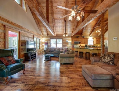 Discover your peaceful forest retreat in this inviting 3-bedroom on Cortez Golf Course in Arkansas - for sale on GolfHomes.com, golf home, golf lot