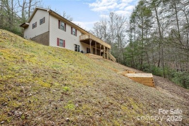 This beautifully updated turn-key furnished home is located on Rumbling Bald Resort on Lake Lure in North Carolina - for sale on GolfHomes.com, golf home, golf lot