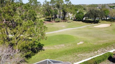 Fantastic views overlooking the golf course in guard gated 55+ on Kings Ridge Golf Club in Florida - for sale on GolfHomes.com, golf home, golf lot