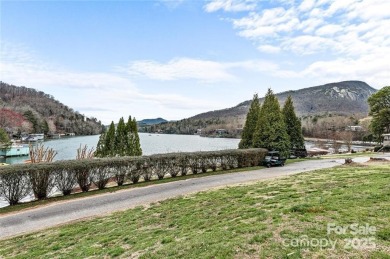 This beautifully updated turn-key furnished home is located on Rumbling Bald Resort on Lake Lure in North Carolina - for sale on GolfHomes.com, golf home, golf lot