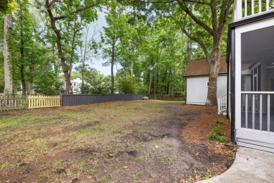 This beautifully updated charmer boasts dual primary suites -- on Snee Farm Country Club in South Carolina - for sale on GolfHomes.com, golf home, golf lot