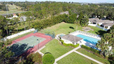 Fantastic views overlooking the golf course in guard gated 55+ on Kings Ridge Golf Club in Florida - for sale on GolfHomes.com, golf home, golf lot